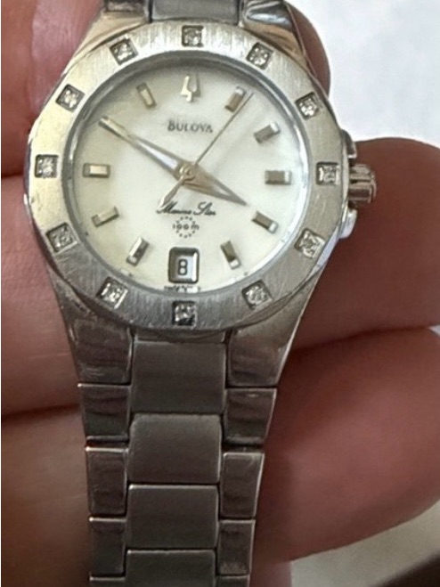 Bulova Silver Tone Watch With White Dial And Diamond Accents